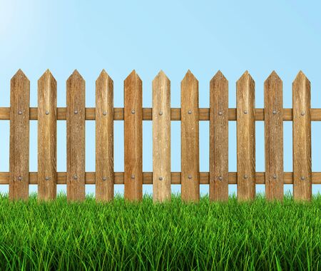 Wooden fence on grass clipping path includedの写真素材