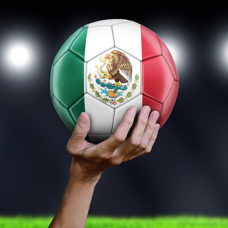 Man holding Soccer ball with Mexican flagの写真素材
