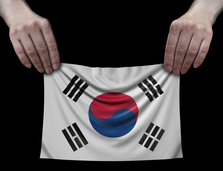 Man holding South Korean flagの写真素材