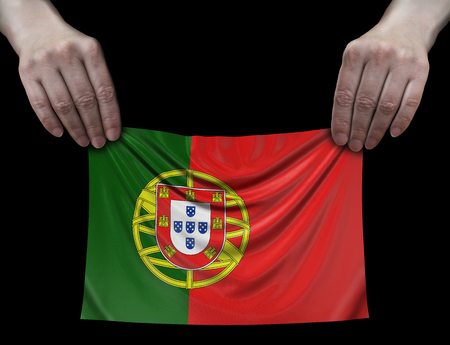 Man holding Portuguese flagの写真素材