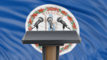 Podium lectern with microphones and Virginia flag in background