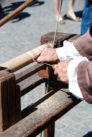 Turner works at one leg of a tableの写真素材