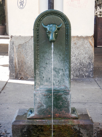 Old fountain in the city of Turin to drink. Piedmont - Italyの写真素材