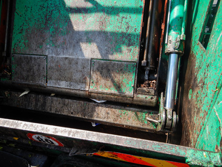Waste trucks and bins at the market of Turinの写真素材