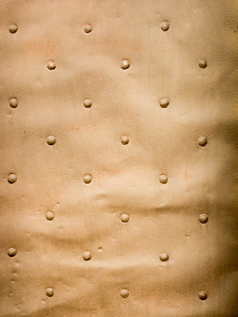 Detail of an ancient metal door of a churchの写真素材