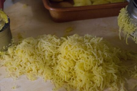 Italian food: mashed potatoes for the preparation of gnocchiの写真素材