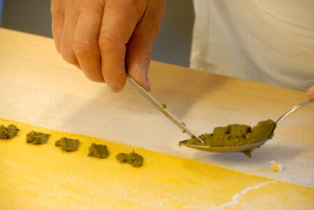 Preparation of agnolotti. Typical pasta of the Langhe, Piedmont - Italyの写真素材