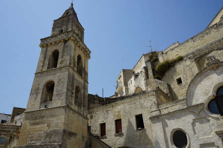 Glimpse of an old church with bell tower in Matera, Basilicata - Italy