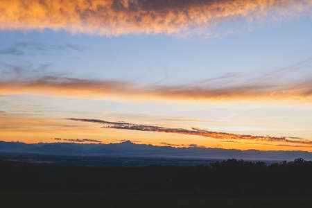 A beautiful view towards evening at sunset of the hills in Alta Langa, Piedmont - Italyの写真素材
