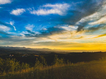 A beautiful view towards evening at sunset of the hills in Alta Langa, Piedmont - Italyの写真素材