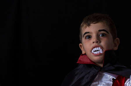 Boy disguised as a vampire. Halloween.の写真素材