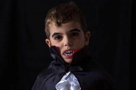 Boy disguised as a vampire. Halloween.の写真素材