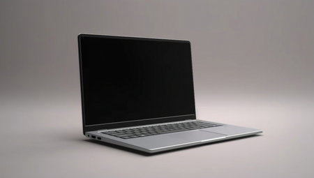 Laptop computer with blank screen on gray background. 3D renderingの素材