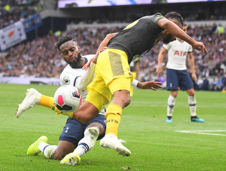 LONDON, ENGLAND - SEPTEMBER 28, 2019: Sofiane Boufal of Southampton and Danny Rose of Tottenham pictured during the 2019/20 Premier League game between Tottenham Hotspur FC and Southamtpon FC at Tottenham Hotspur Stadium.のeditorial素材