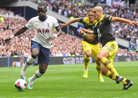 LONDON, ENGLAND - SEPTEMBER 28, 2019: Moussa Sissokko of Tottenham and Oriol Romeu Vidal of Southampton pictured during the 2019/20 Premier League game between Tottenham Hotspur FC and Southamtpon FC at Tottenham Hotspur Stadium.のeditorial素材