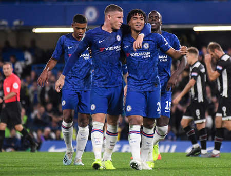 LONDON, ENGLAND - SEPTEMBER 25, 2019: Reece James of Chelsea celebrates with Ross Barkley of Chelsea after he scored a goal during the 2019/20 EFL Cup Round 3 game between Chelsea FC and Grimsby Town FC at Stamford Bridge.のeditorial素材