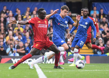 LONDON, ENGLAND - SEPTEMBER 22, 2019: Sadio Mane of Liverpool (L) and Andreas Christensen of Chelsea (R) pictured during the 2019/20 Premier League game between Chelsea FC and Liverpool FC at Stamford Bridge.のeditorial素材