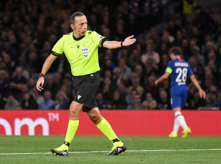 LONDON, ENGLAND - SEPTEMBER 17, 2019: Turkish FIFA referee Cuneit Cakir pictured during the 2019/20 UEFA Champions League Group H game between Chelsea FC (England) and Valencia CF (Spain) at Stamford Bridge.のeditorial素材