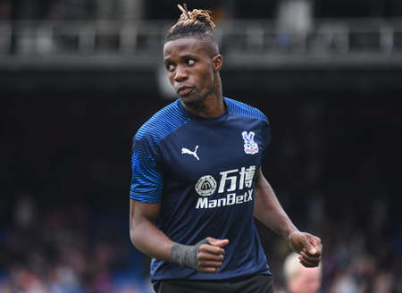 LONDON, ENGLAND - AUGUST 31, 2019: Wilfried Zaha of Palace pictured ahead of  the 2019/20 Premier League game between Crystal Palace FC and Aston Villa FC at Selhurst Park.のeditorial素材