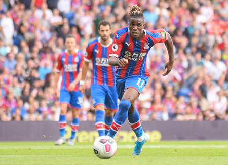 LONDON, ENGLAND - AUGUST 31, 2019: Wilfried Zaha of Palace pictured during the 2019/20 Premier League game between Crystal Palace FC and Aston Villa FC at Selhurst Park.のeditorial素材