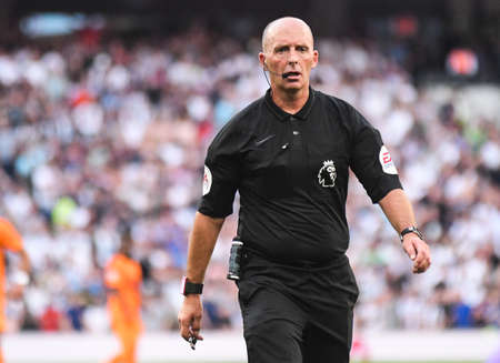 LONDON, ENGLAND - AUGUST 25, 2019: Referee pictured during the 2019/20 Premier League game between Tottenham Hotspur FC and Newcastle United FC at Tottenham Hotspur Stadium.のeditorial素材