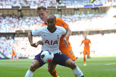 LONDON, ENGLAND - AUGUST 25, 2019: Lucas Moura of Tottenham and Matt Ritchie of Newcastle pictured during the 2019/20 Premier League game between Tottenham Hotspur FC and Newcastle United FC at Tottenham Hotspur Stadium.のeditorial素材