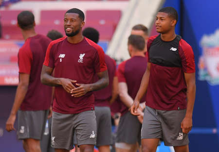 MADRID, SPAIN - MAY 31, 2019: Georginio Wijnaldum of Liverpool (L) and Rhian Brewster of Liverpool (R) pictured during a training session held one day before the 2018/19 UEFA Champions League Final between Tottenham Hotspur (England) and Liverpool FC (Engのeditorial素材