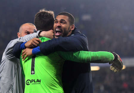LONDON, ENGLAND - MAY 9, 2019: Ruben Loftus-Cheek of Chelsea hugs Kepa Arrizabalaga of Chelsea after the second leg of the 2018/19 UEFA Europa League Semi-Finals game between Chelsea FC (England) and Eintracht Frankfurt e.V. (Germany) at Stamford Bridge.のeditorial素材