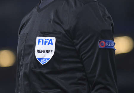 LONDON, ENGLAND - APRIL 18, 2019: Assistant referee badge pictured during the second leg of the 2018/19 UEFA Europa League Quarter-Finals game between Chelsea FC (England) and SK Slavia Praha (Czech Republic) at Stamford Bridge.のeditorial素材