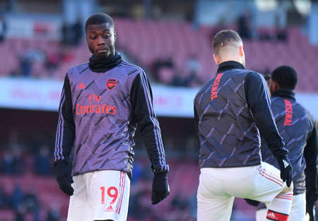 LONDON, ENGLAND - JANUARY 18, 2020: Nicolas Pepe of Arsenal pictured ahead of the 2019/20 Premier League game between Arsenal FC and Sheffield United FC at Emirates Stadium.のeditorial素材