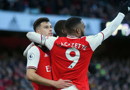 LONDON, ENGLAND - JANUARY 18, 2020: Gabriel Martinelli of Arsenal and Alexandre Lacazette of Arsenal celebrate a goal scored during the 2019/20 Premier League game between Arsenal FC and Sheffield United FC at Emirates Stadium.のeditorial素材