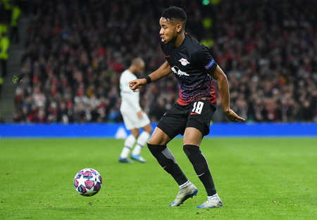 LONDON, ENGLAND - FEBRUARY 19, 2020: Christopher Nkunku of Leipzig pictured during the first leg of the 2019/20 UEFA Champions League Round of 16 game between Tottenham Hotspur FC and RB Leipzig at Tottenham Hotspur Stadium.のeditorial素材