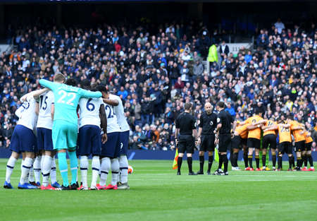 LONDON, ENGLAND - MArch 1, 2020: The two sets of players and the referees pictured seconds prior to...