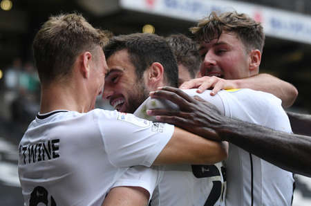MILTON KEYNES, ENGLAND - SEPTEMBER 25, 2021: Troy Parrott celebrates after he scored the opener during the 2021/22 SkyBet EFL League One matchweek 9 game between MK Dons FC and Wycombe Wanderers.のeditorial素材