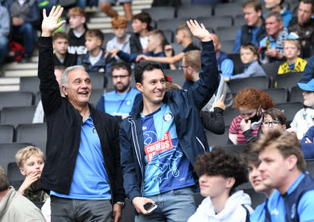 MILTON KEYNES, ENGLAND - SEPTEMBER 25, 2021: Wycombe fans pictured in the stands ahead of the...