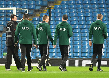 MANCHESTER, ENGLAND - NOVEMBER 1, 2016: The Hungarian FIFA referee brigade inspecting the pitch...
