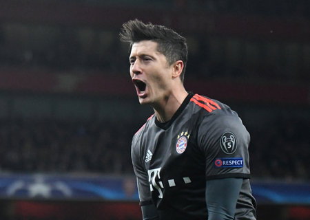 LONDON, ENGLAND - MARCH 7, 2017: Robert Lewandowski of Bayern celebrates after he scored a goal during the second leg of the UEFA Champions League Round of 16 game between Arsenal FC and Bayern Munchen at Emirates Stadium. Copyright: Cosmin Iftode/Picstafのeditorial素材