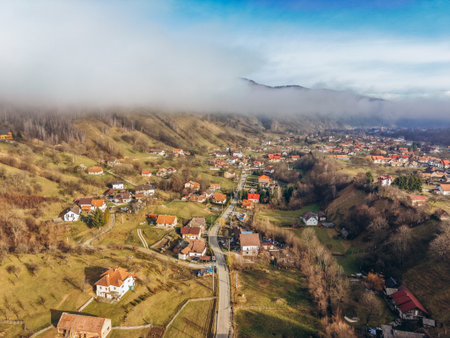 Aerial View of Moeciu de Jos Village in the Carpathian Mountains, Romaniaの写真素材