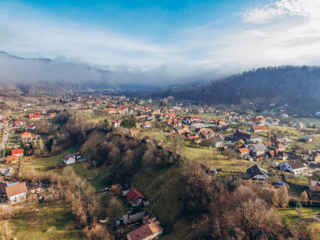 Aerial View of Moeciu de Jos Village in the Carpathian Mountains, Romaniaの写真素材