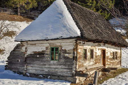 An old barn  in the Moeciu de Jos village in Romania. It is used only in spring, summer and autumn seasonsの写真素材