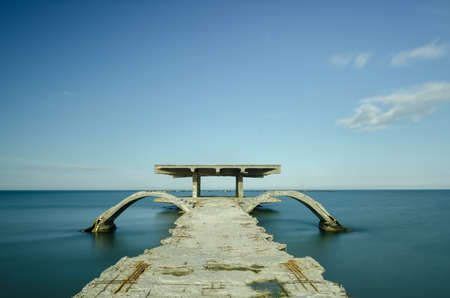 Abandoned pontoon at the seasideの写真素材