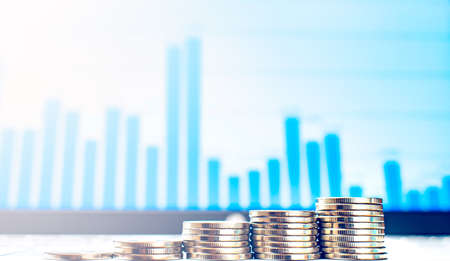 Online Money. coins on a laptopの写真素材