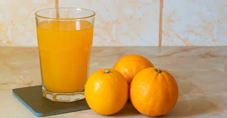 Glass of orange juiceの写真素材
