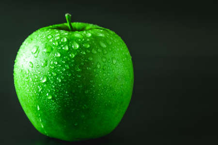 wet green appleの写真素材