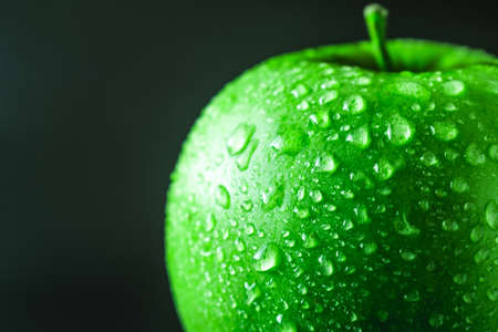 wet green appleの写真素材