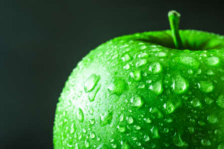 wet green appleの写真素材