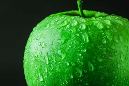 wet green appleの写真素材