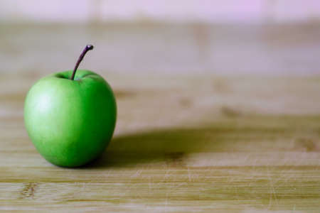 Organic grown green appleの写真素材