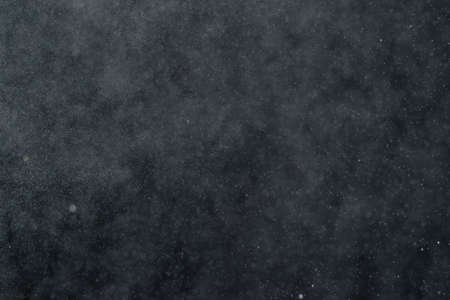 abstract splashes of water on a black backgroundの写真素材
