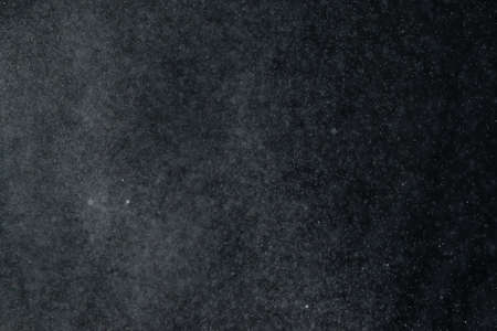 abstract splashes of water on a black backgroundの写真素材